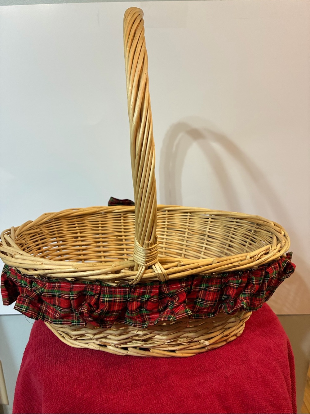 This is a vintage woven willow wicker harvest basket